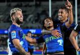 Taufa Funaki (C) was one of the Blues' tryscorers in the big win over the Highlanders in Auckland. (Andrew Cornaga/AAP PHOTOS)