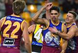 Brisbane's Charlie Cameron (centre) scored five goals as the Lions thrashed Richmond at the Gabba. (Jono Searle/AAP PHOTOS)