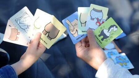 Go Bum is a cheeky version of the card game Go Fish! where you match bums instead of animals or fish. Picture by Sylvia Liber