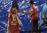Pat Cummins walks off the rain-hit stadium at Hyderabad, knowing Sunrisers are in the playoffs. (AP PHOTO)