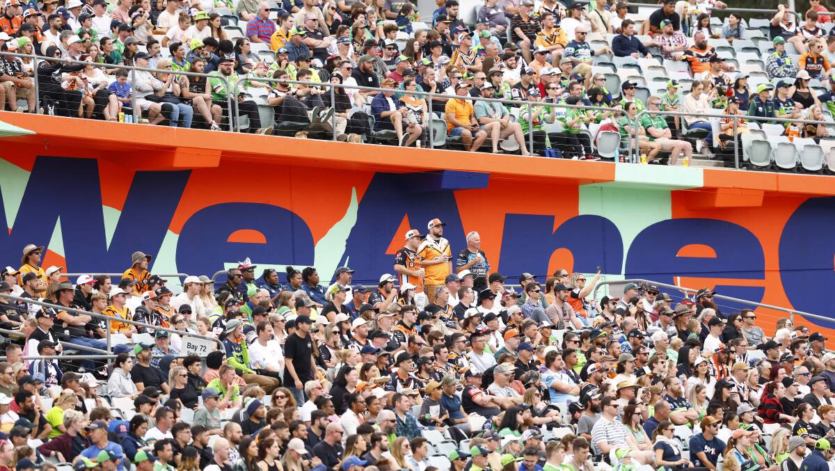Fans in the Canberra Stadium stands. Picture by Keegan Carroll