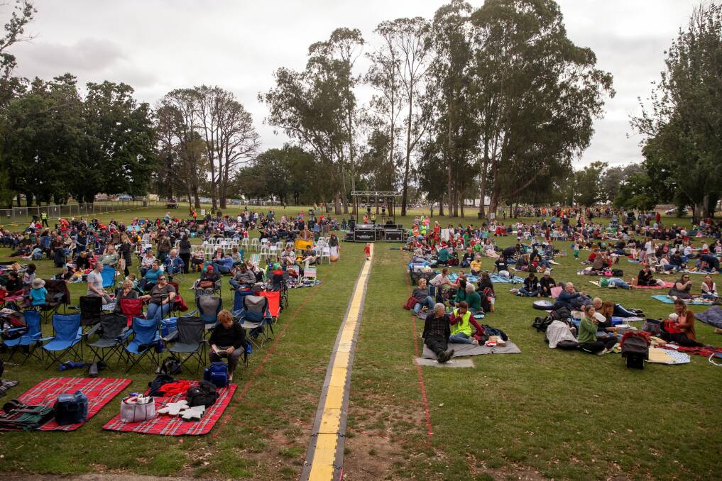 People begin to arrive for the Carols might by Stage 88. Picture: Sitthixay Ditthavong