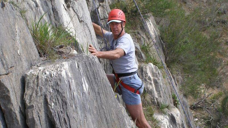 Brett Lentfer, pictured here climbing in Queanbeyan in 2013, has been remembered as an energetic and kind man. Picture: Armando Corvini