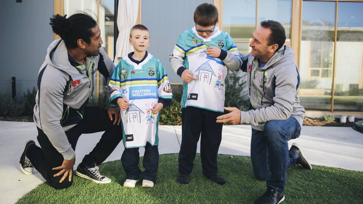Charity work is never far away for the Raiders: Sia Soliola and Ricky Stuart meet with Jayden and Max to unveil Ricky Stuart Foundation jerseys.