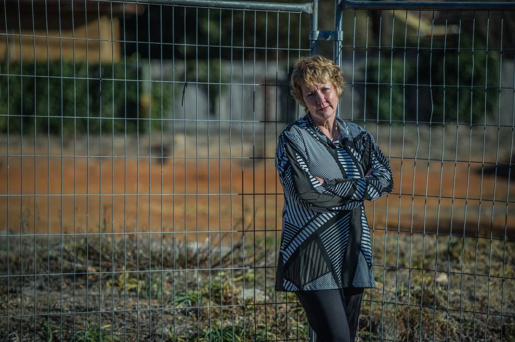 Former Mr Fluffy home owner Felicity Prideaux in front of the block where her previous home in Hackett stood, in 2017. Picture: Karleen Minney
