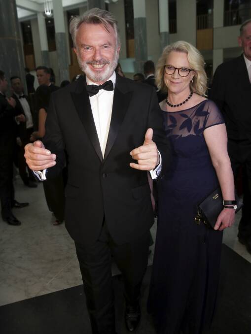 Neill and Laura Tingle arrive for the Mid Winter Ball at Parliament House in 2018. Picture: Alex Ellinghausen