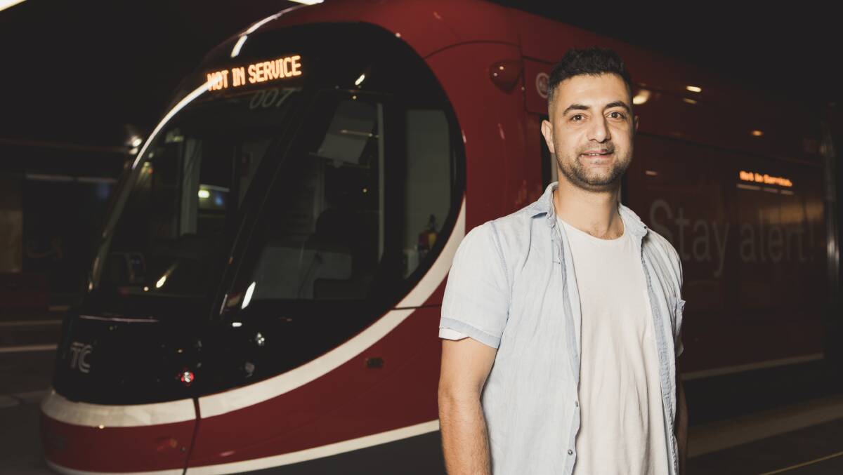 Cool Barbers owner Hesam Najafian hopes light rail will bring more business to his shop. Photo: Jamila Toderas
