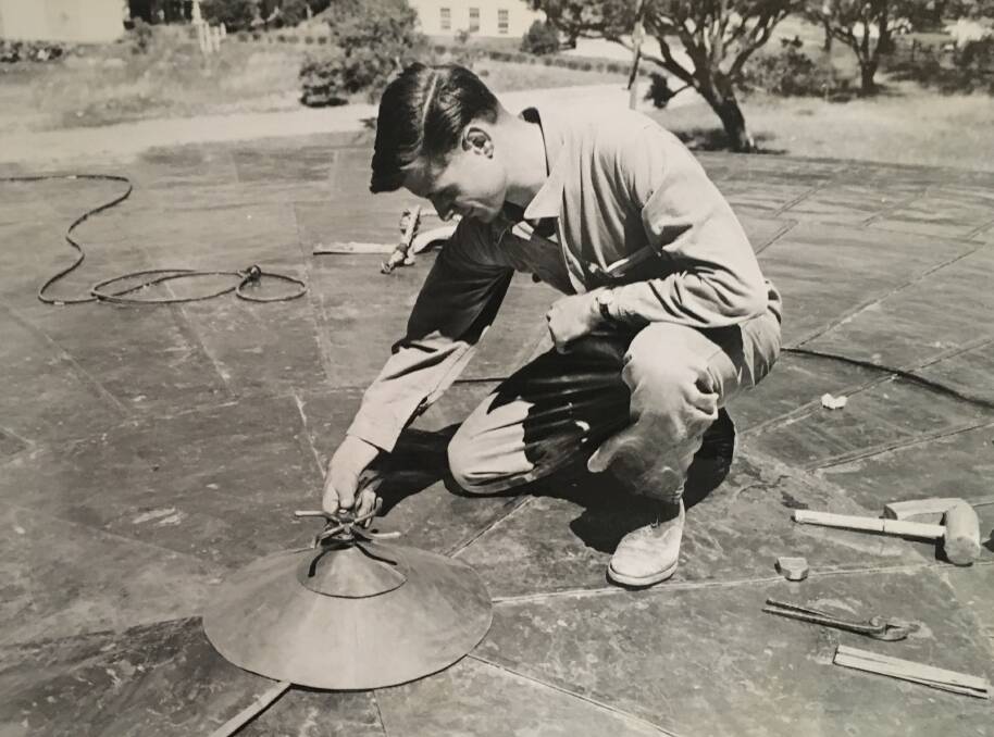A sprinkler was placed atop the dome to wet the copper-coated roof to help it oxidise. Photo: Australian Academy of Science, John Edwards of Capital J Plan Printing & Photographic Co. Pty. Ltd