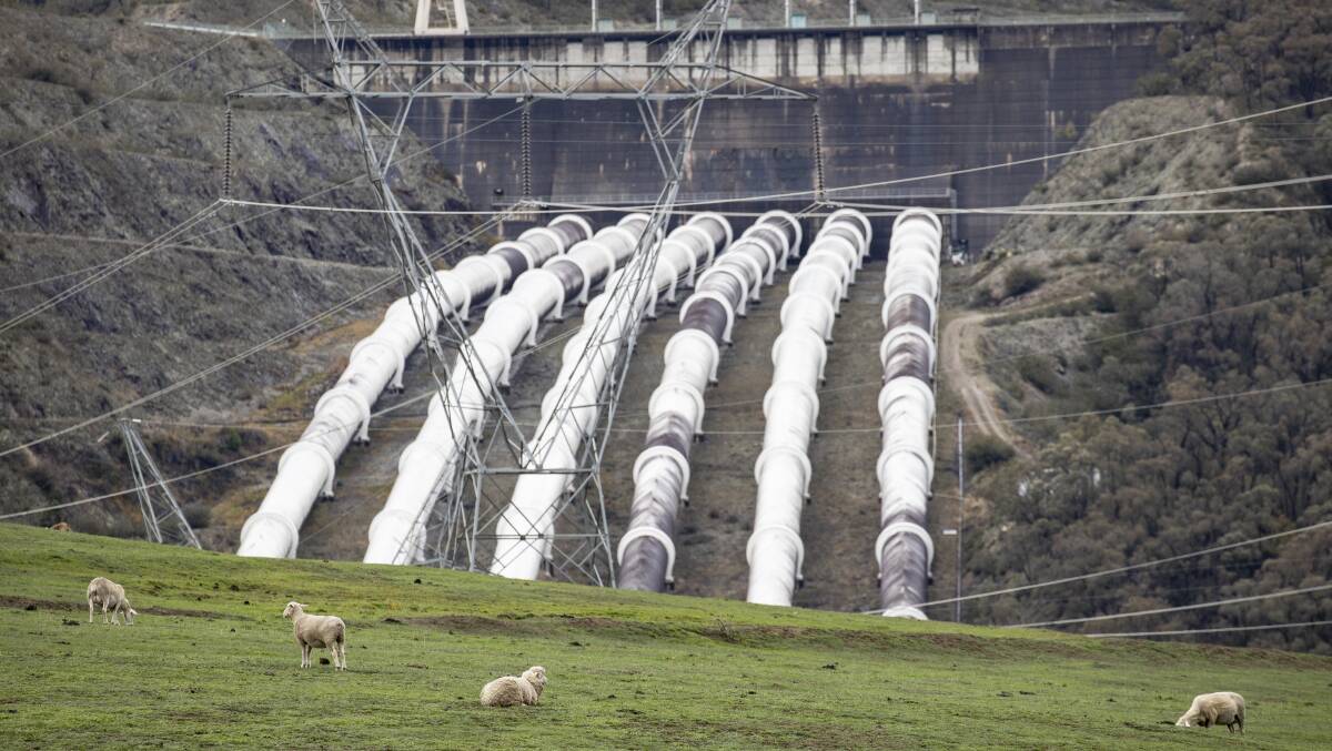 The Tumut 3 power station looms over farmland near Talbingo in Eden-Monaro. Picture: Sitthixay Ditthavong