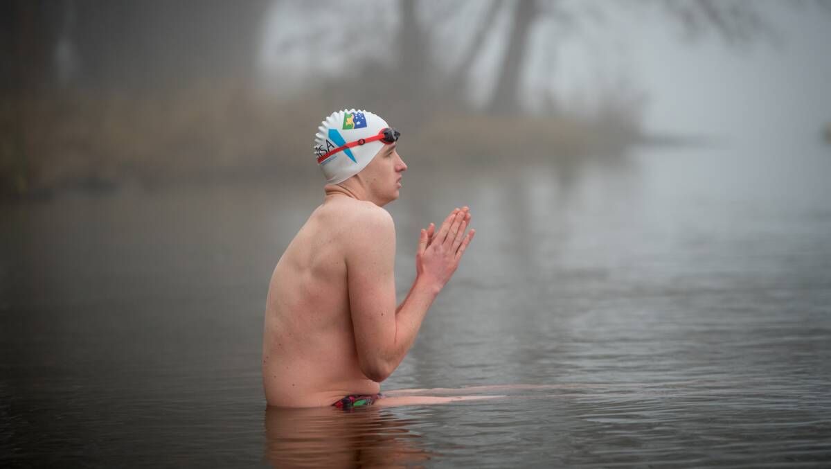 Ice swimmer Ben Freeman, who regularly plunges into Lake Burley Griffin, takes ice baths and swims in neighbours unheated pools to prepare for his unique event, photographed in the lake on Wednesday. Picture: Karleen Minney
