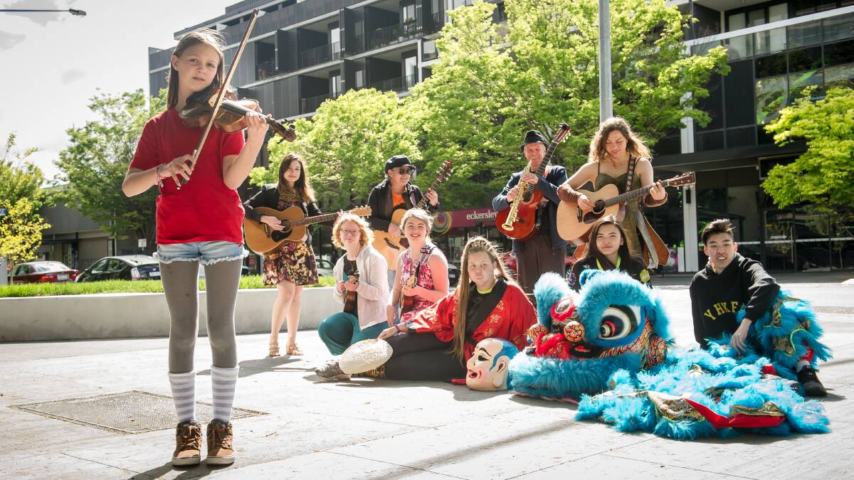 Canberra buskers including Sophie Fisher (front) will be taking part in the Braddon Busking Festival. Picture: Elesa Kurtz