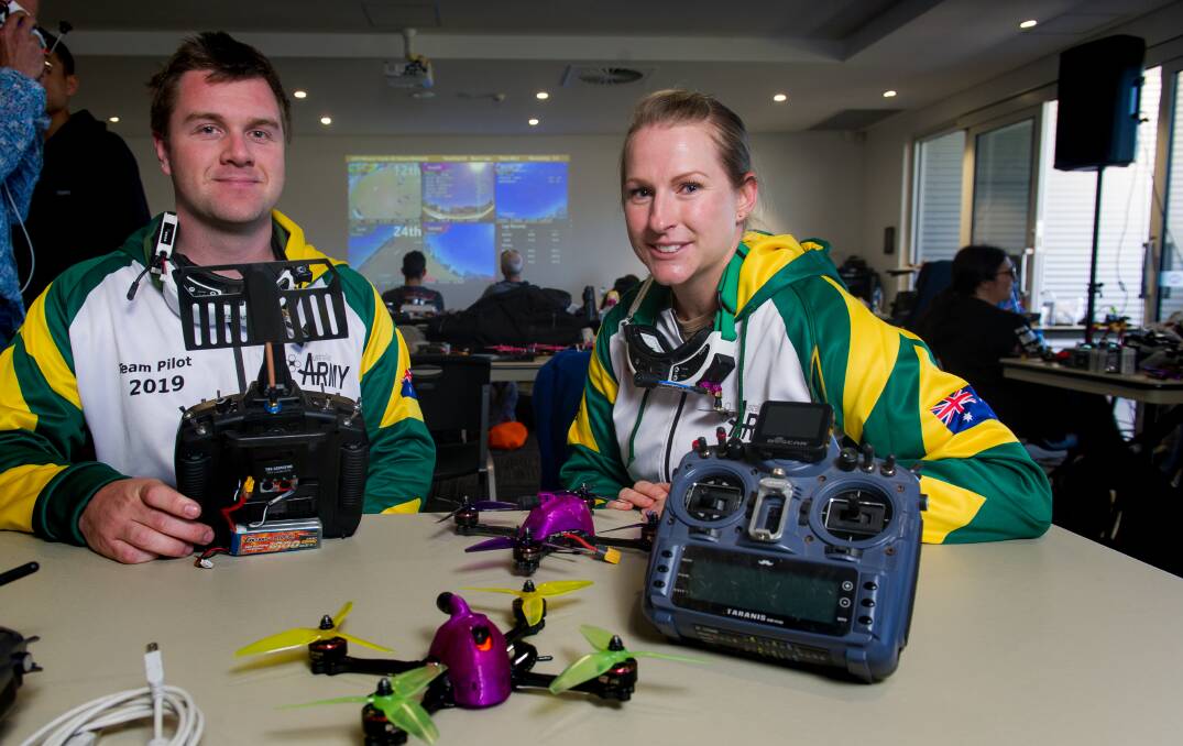Lieutenant Thomas Gash and Major Jaymi Matthews are members of the army team in the national drone racing championships at Phillip Oval this weekend. Picture: Elesa Kurtz