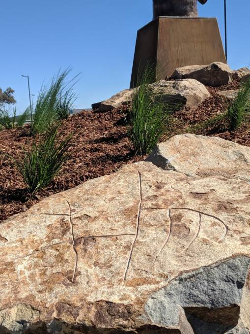 G.W. Bot also carved symbols into the rocks around the new sculpture at Ginninderry.