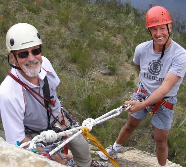 Armando Corvini (left) training Brett Lentfer in climbing in Queanbeyan in 2013. Picture: Armando Corvini