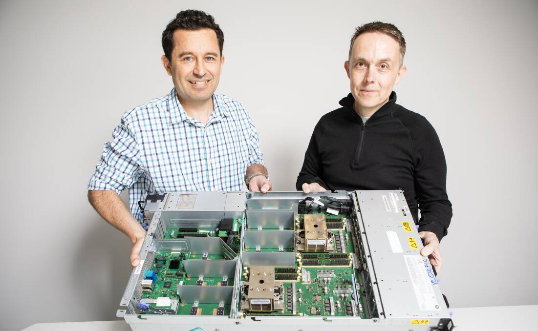 IBM distinguished engineer, Anton Blanchard, and senior engineer Michael Neuling, with a node from the Summit supercomputer, which has been named the fastest in the world. Picture: Jamila Toderas