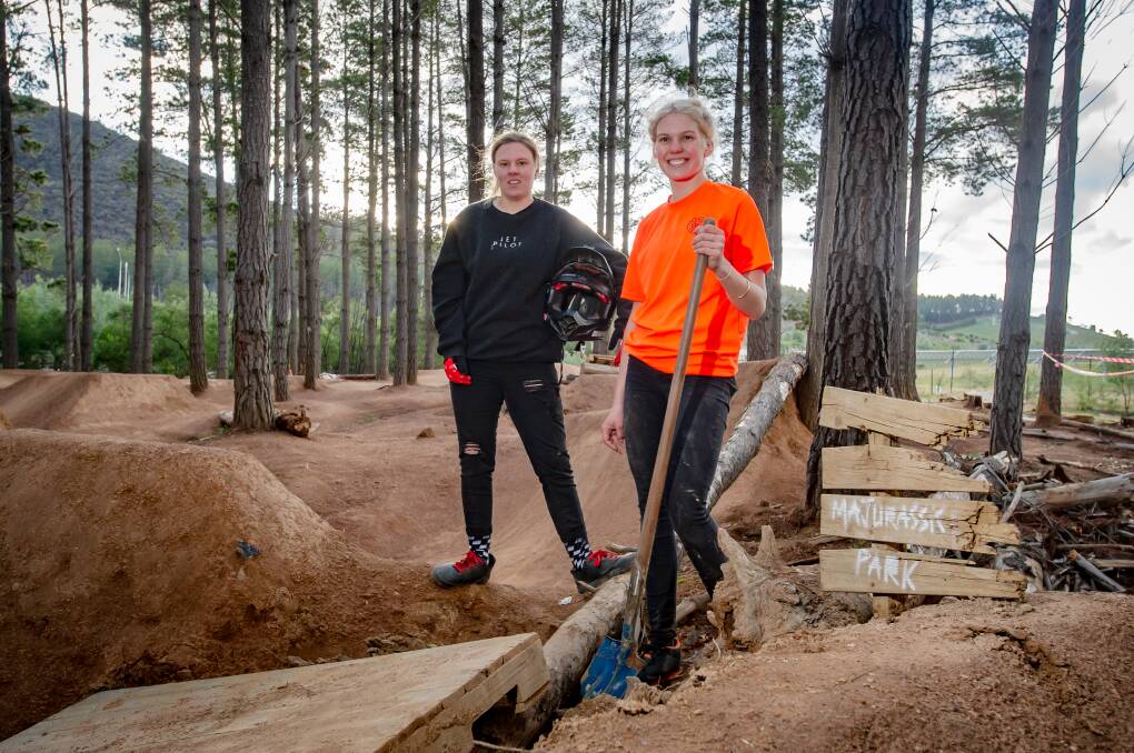 Harriet Burbidge-Smith, 24, and Zoe Cuthbert, 19, volunteer their time to make the trails. Picture: Elesa Kurtz 