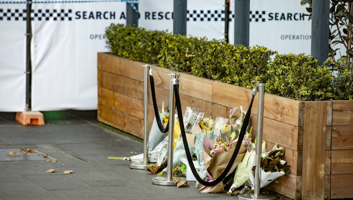 Flowers left outside Kokomo's nightclub in Civic after the death of Pitasoni Ulavalu. Picture: Sitthixay Ditthavong.