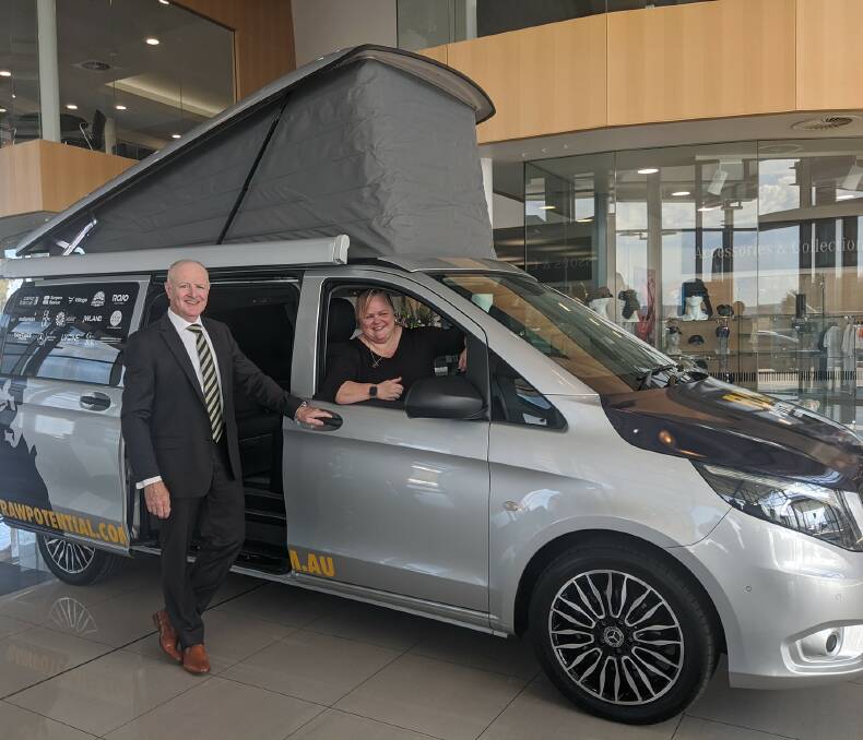 Raw Potential chair Paul Kane and youth outreach worker Gabrielle Penn picking up the new van from Mercedes Benz Canberra.