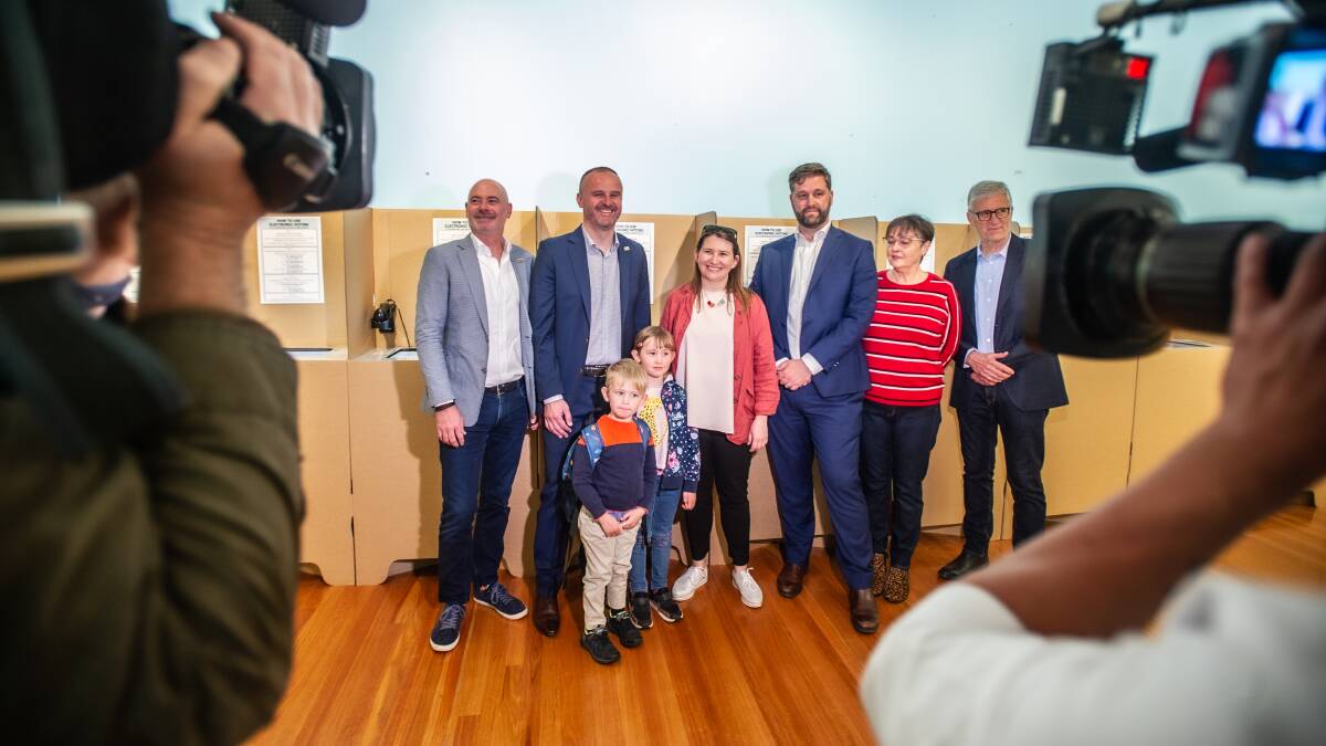Chief Minister Andrew Barr, partner Anthony, and his family cast their votes on the first day of official voting for the 2020 ACT election. Picture: Karleen Minney.