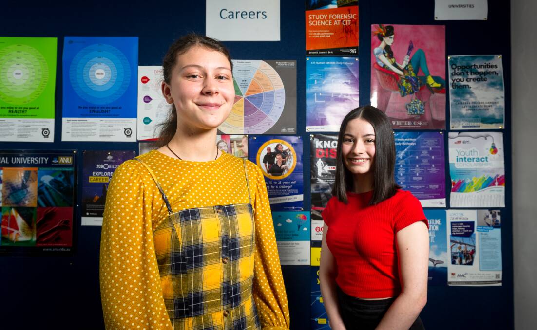 Canberra College year 12 students Ana Cecez, 17, and Ellie McDougall, 17, have been doing work experience online due to COVID-19. Picture: Elesa Kurtz 