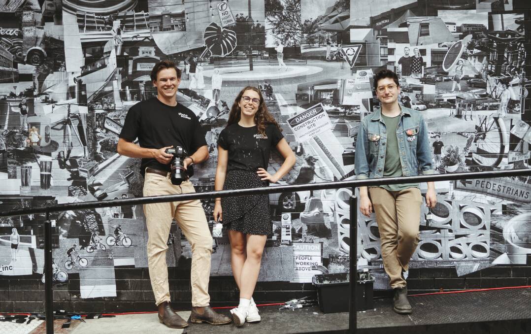 PhotoAccess artists Fred McGrath Weber, Kate Matthews and Rory Gillen at the PhotoAccess public portrait mural-making event Faces of Braddon. Picture: Dion Georgopoulos