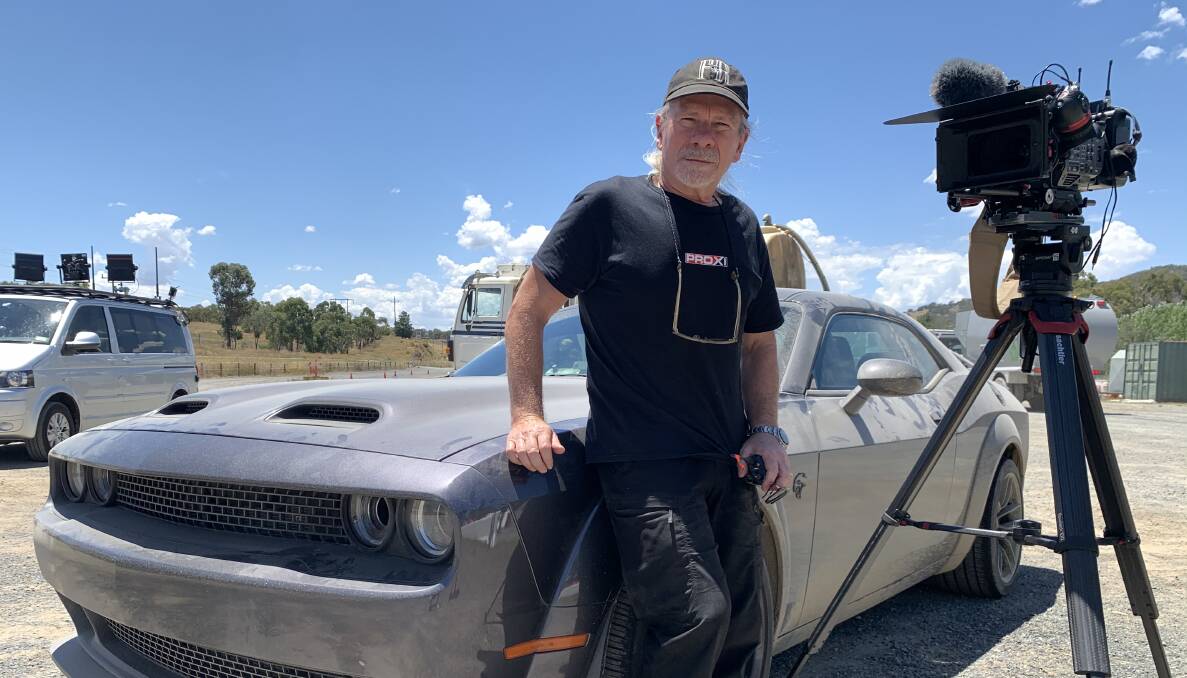 Stuntman turned director Guy Norris, with the Dodge Challenger Hellcat, which is the hero car in Blacklight's stunts. Picture: Mario Biancacci