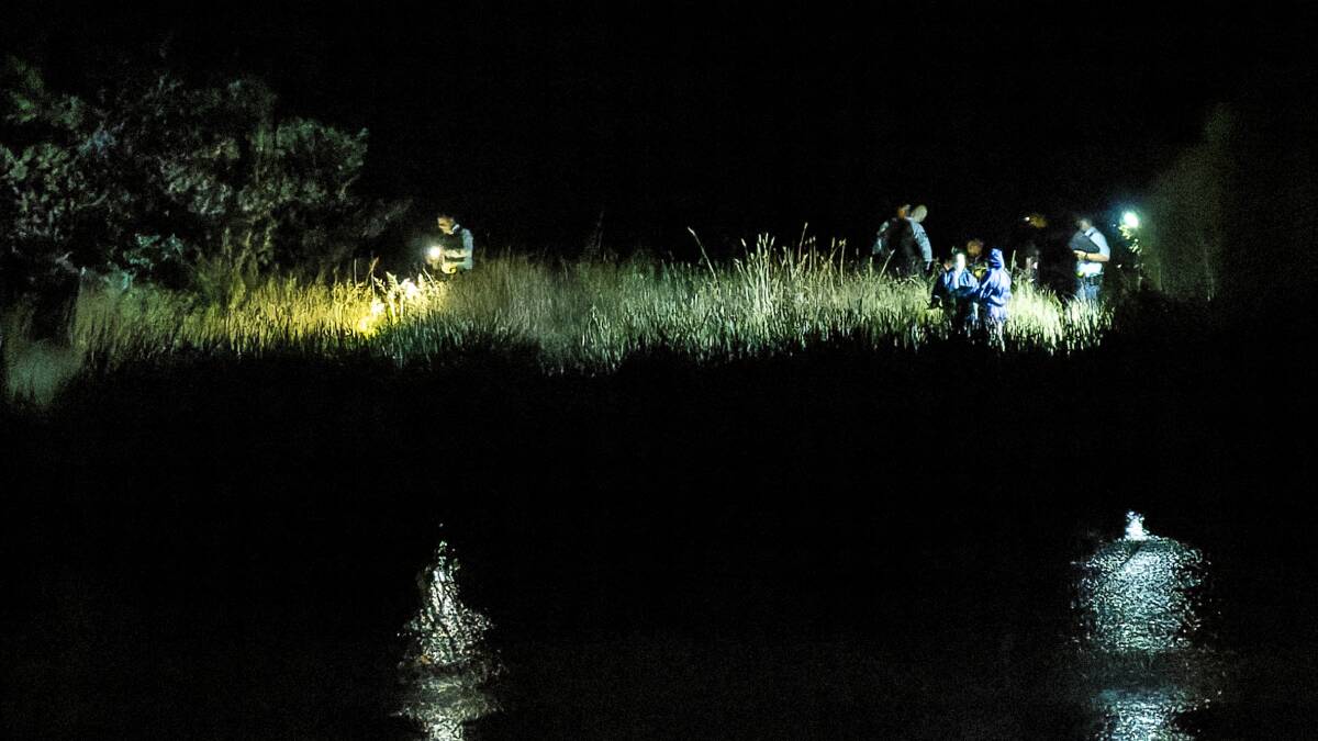 Police were searching the area near Lake Ginninderra northwest of Lawson late Monday after a body was found. Picture by Sitthixay Ditthavong