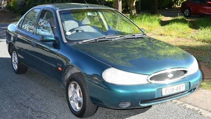 The Green Ford Mondeo allegedly used in an arson attack. Picture ACT Policing