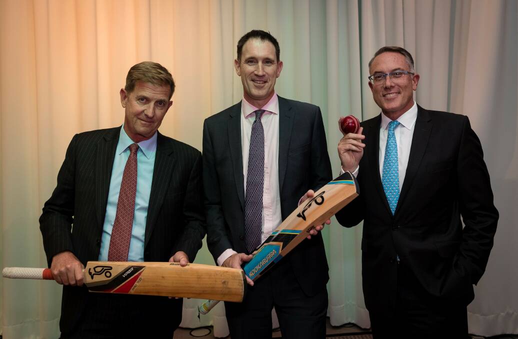 Pick the Channel Seven executive. That would be chief executive Tim Worner, on the left, who appears to be grimacing after he got the cricket TV rights. He's joined by former Cricket Australia CEO James Sutherland and Fox Sports' Patrick Delaney, who seem to like cricket a lot more. Picture: Getty Images
