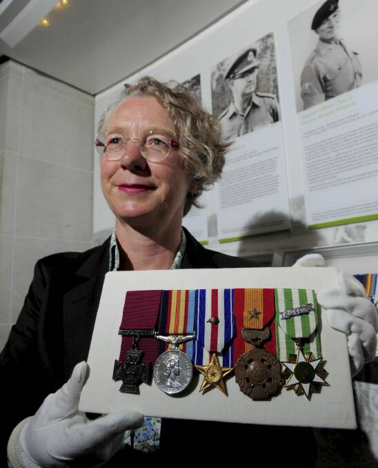 Peter Badcoe's Victoria Cross and cluster of medals belonging to the late were handed to the Australian War Memorial by Ms Mandy Paul of History South Australia. Photo: Graham Tidy