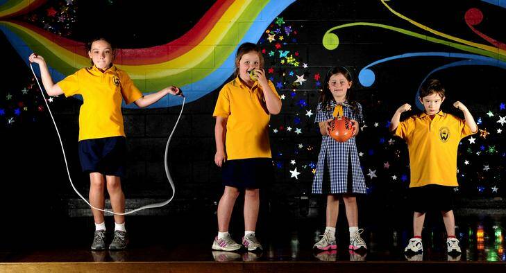Weetangera Primary School exercise and eating program for overweight children. Kyah Churches (8), Ayva Churches (6), Olivia Milner (6) and Jonathan Jenkin (6) have improved their body composition and fitness. Photo: Stuart Walmsley