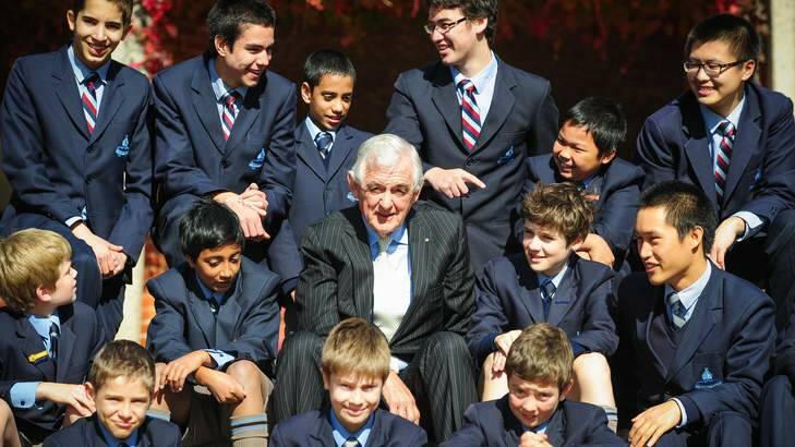 Terry Snow with Canberra Grammar School students after yesterday's announcement. Photo: Katherine Griffiths