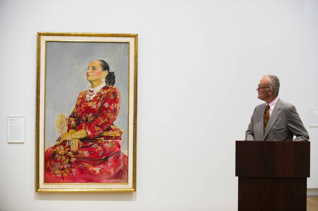 Gallery director Angus Trumble speaks at the unveiling of the portrait of Helena Rubinstein by Graham Sutherland.She is wearing a red brocade Balenciaga gown.  Photo: Rohan Thomson