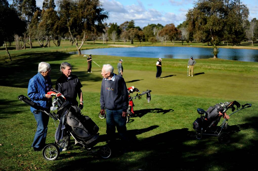 Capital Golf course, Narrabundah. club president Ian O'Donnell, centre, with members, Heike Elvers and Frank Thomas in this 2010 file photo. Photo: Marina Neil