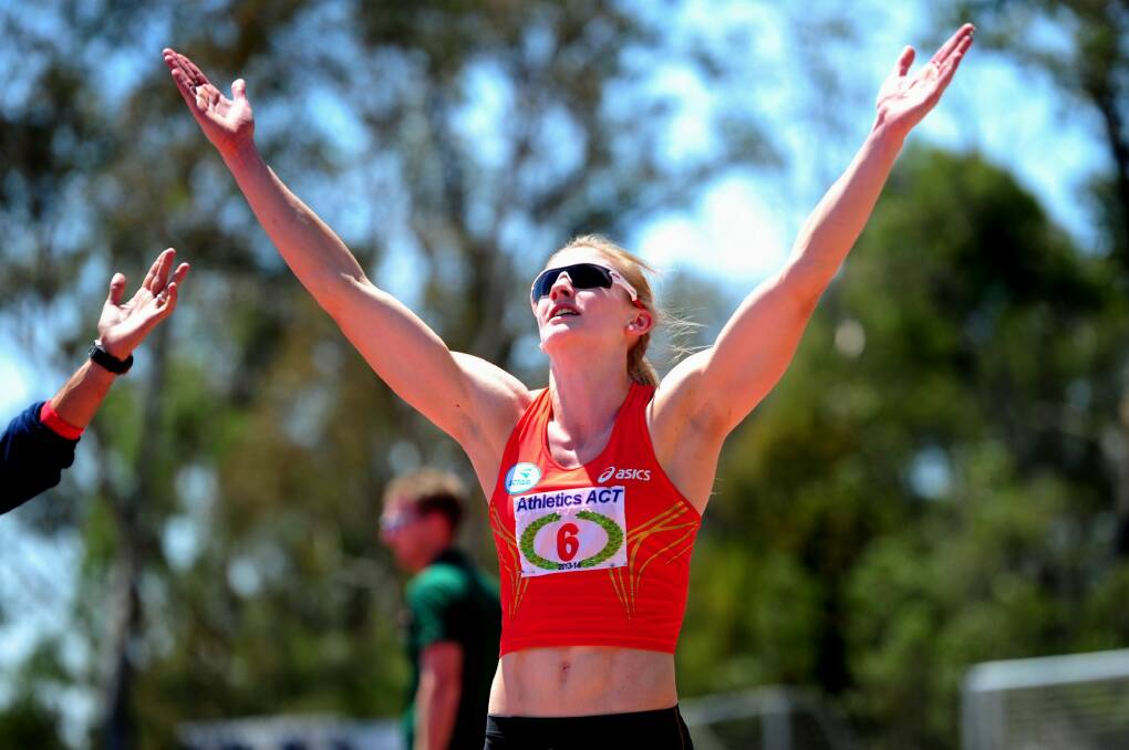 Melissa Breen celebrates after breaking the Australian women's 100m record. Photo: Melissa Adams