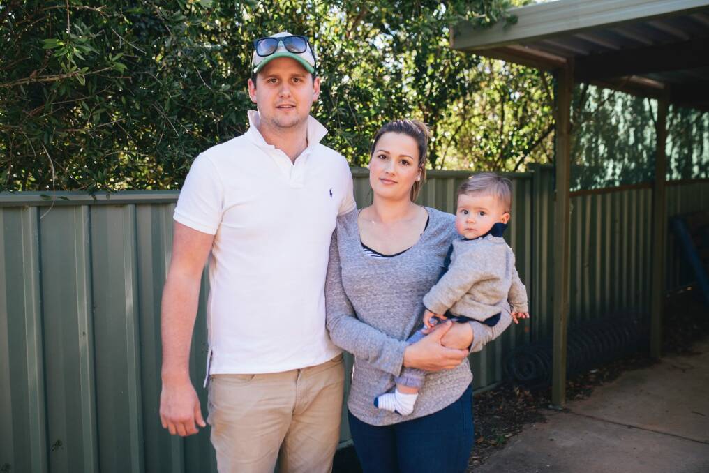 Toby Mildren, Elyse Boorman and their son Darcy, 7 months, are happy their stolen car was located and returned. Photo: Rohan Thomson