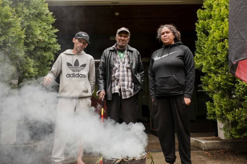 From left, Ngunnawal representative Charlie Brown, Aboriginal elder Uncle Kevin Buzzacott, and Ngunnawal representative Nioka Coe outside the Lobby restaurant on Monday.  Photo: Jamila Toderas