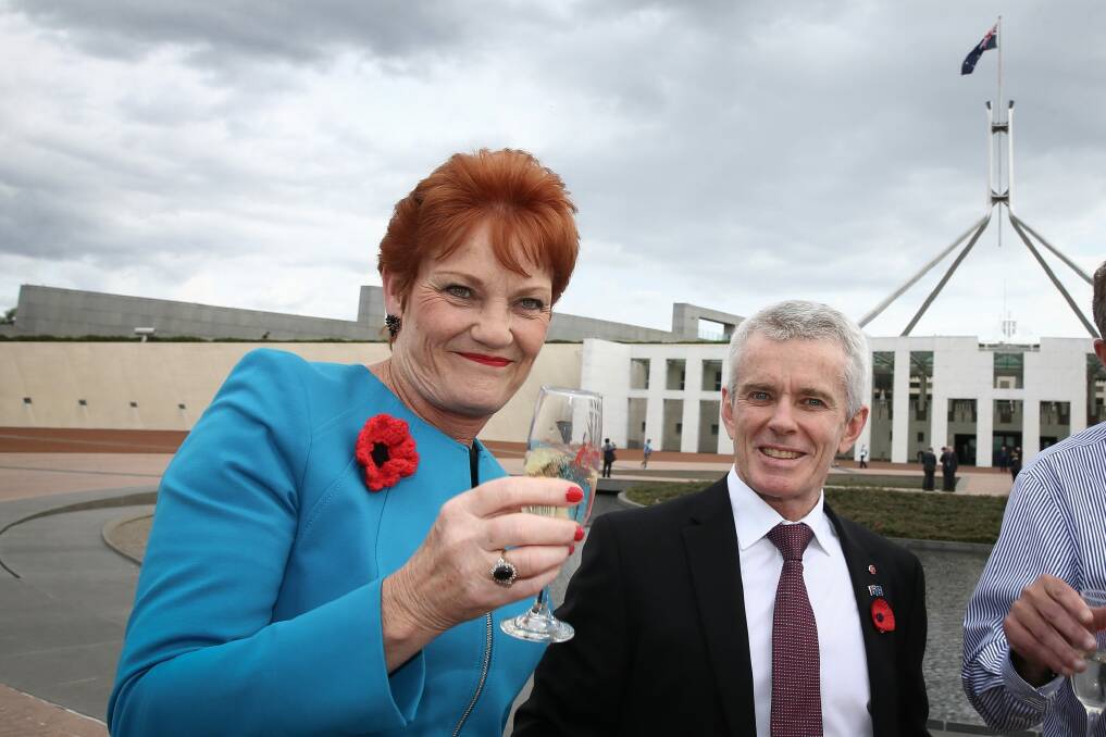 Senator Pauline Hanson with Senator Malcolm Roberts at Parliament House. Photo: Alex Ellinghausen