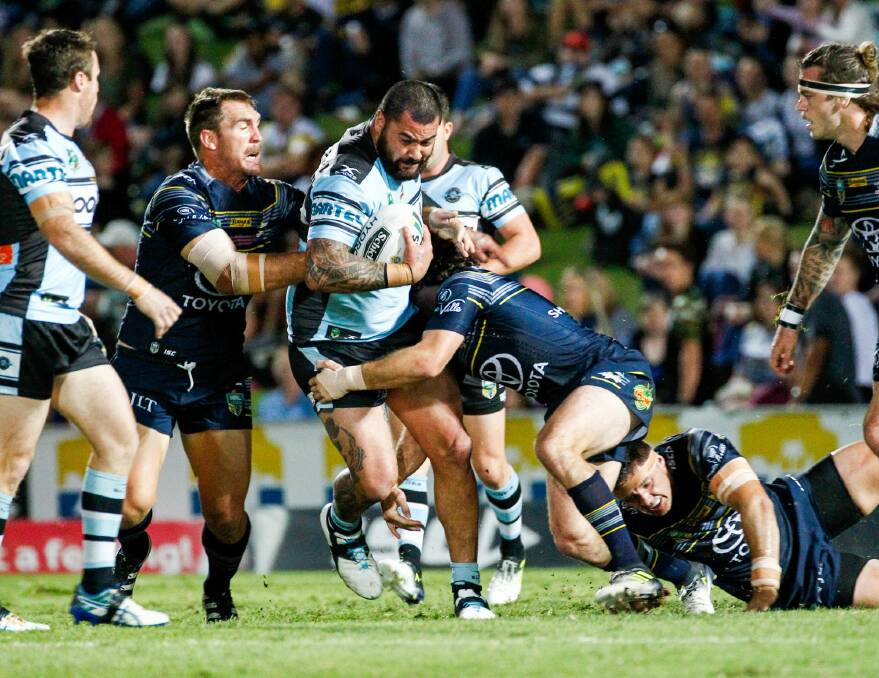 Raw power: Andrew Fifita muscles his way through the Cowboys defence. Photo: AAP