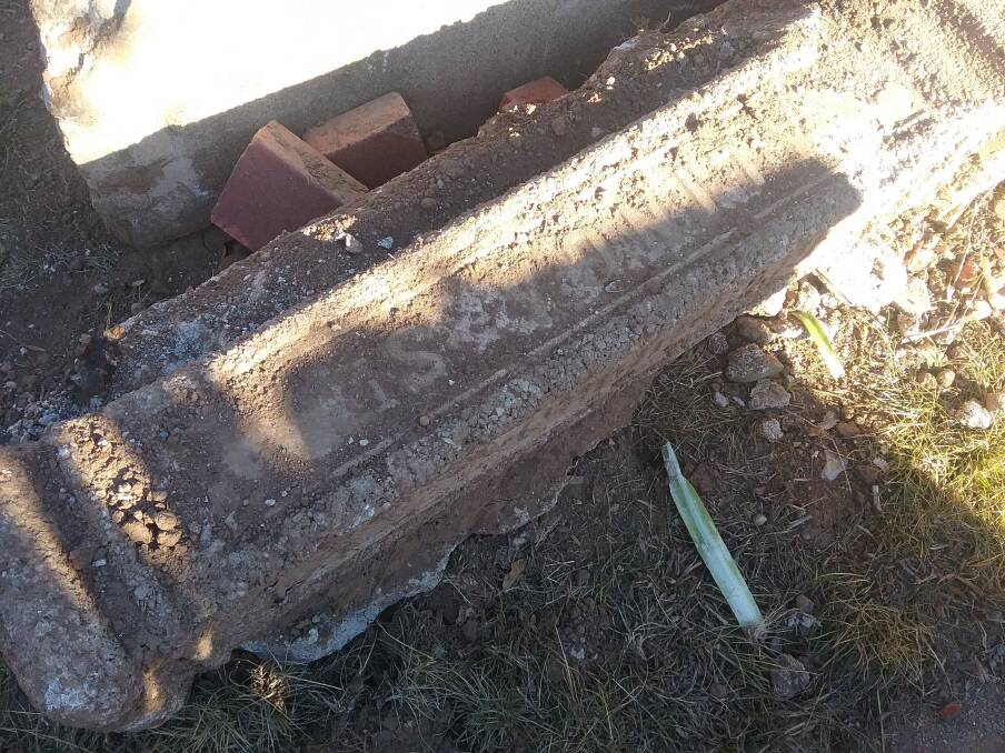 One of the old street markers uncovered in a Narrabundah front yard. Photo: Supplied
