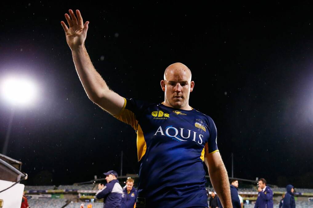 Sad farewell: Stephen Moore leaves the field for the last time as a Brumbies player. Photo: Getty Images
