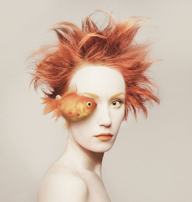 Photographer Flora Borsi's self-portrait with a goldfish.  Photo: Flora Borsi and designboom.
