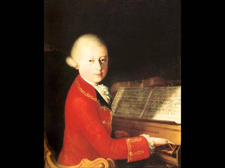 Young Mozart at the keyboard.