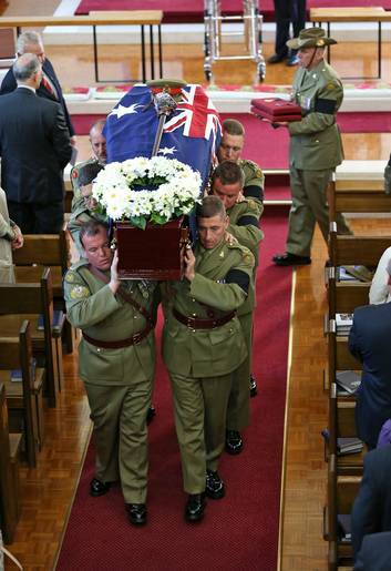 Major General Alan Stretton's pallbearers carry the casket from the Royal Military College Chapel in Canberra. Photo: Supplied