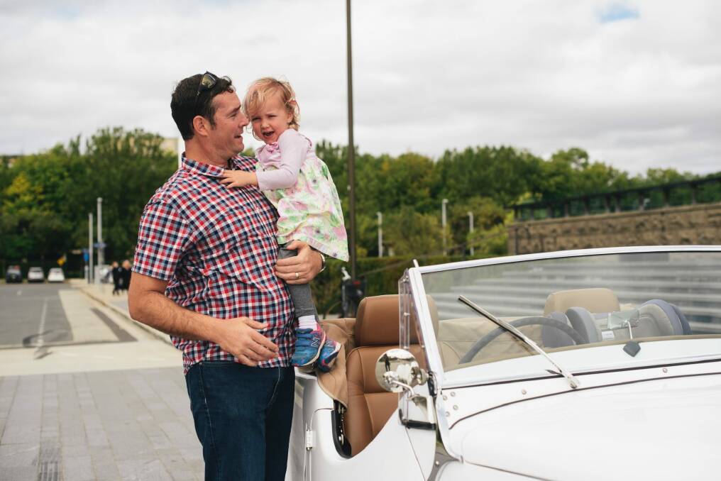 Canberra toddler Chloe with dad Peter loves playing Elmo in the car to daycare. Photo: Rohan Thomson