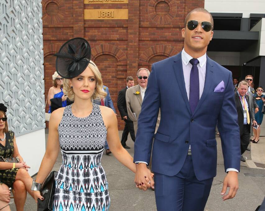 High profile: Louise Pillidge and Blake Garvey make their first official appearance as a couple at the 2014 Melbourne Cup.  Photo: Getty Images