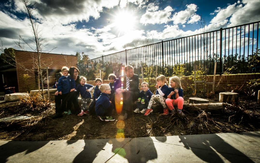 St Anthony's Parish Primary principal Greg Walker and Early Learning Centre director Sharon O'Brien with some of their students. Photo: karleen minney