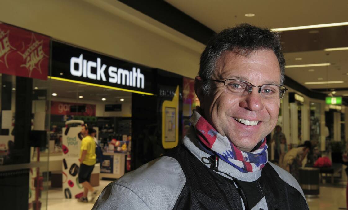 Outside the Majura Park store is long time customer, Ray Arthurs, of Conder, who hopes the Dick Smith stores survive. Photo: Graham Tidy