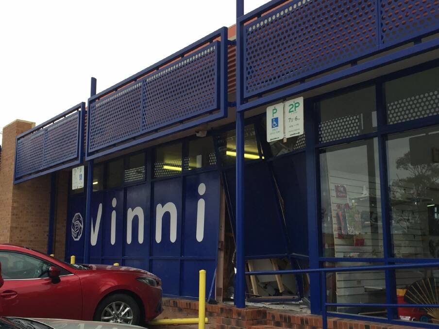 A car has accidentally crashed into the St Vincent de Paul charity shop in Tuggeranong. Photo: Supplied