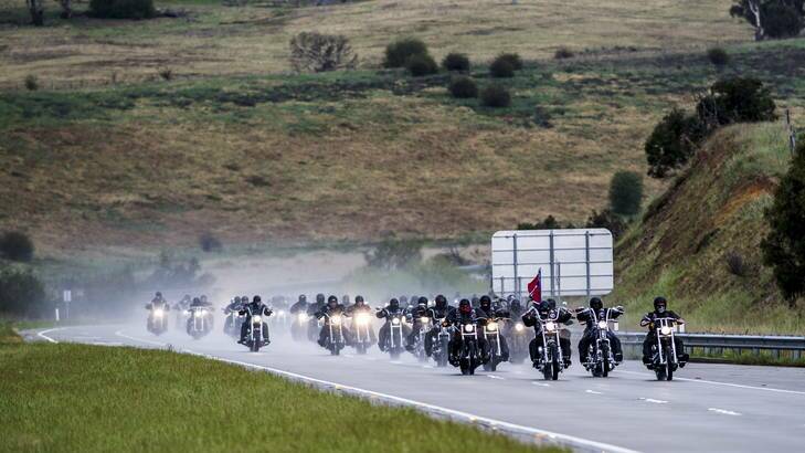 Rebels on the Federal Highway on their way to Canberra on Saturday as part of their annual national run. Photo: Rohan Thomson